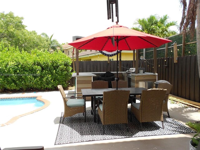 12940 SW 142nd Ter, Miami, FL 33186 - view of patio / terrace featuring outdoor dining space and a grill