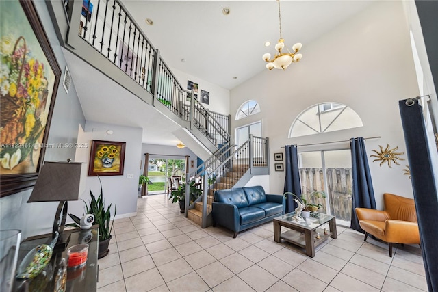 11018 NW 47th Ter, Doral, FL 33178 - tiled living room featuring stairway, a chandelier, and a high ceiling