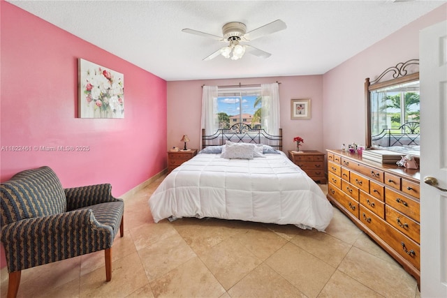 11018 NW 47th Ter, Doral, FL 33178 - bedroom with ceiling fan and light tile patterned floors