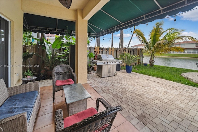 11018 NW 47th Ter, Doral, FL 33178 - view of patio / terrace with area for grilling and a water view