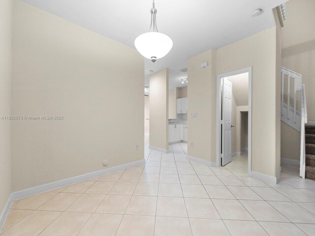 2590 SE 14th St, Homestead, FL 33035 - empty room featuring stairs and light tile patterned floors