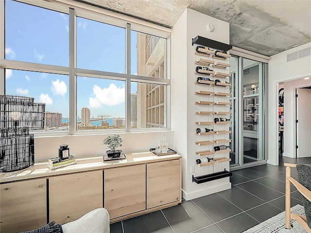 3301 NE 1st Ave Unit H1215, Miami, FL 33137 - wine cellar featuring dark tile patterned floors and plenty of natural light