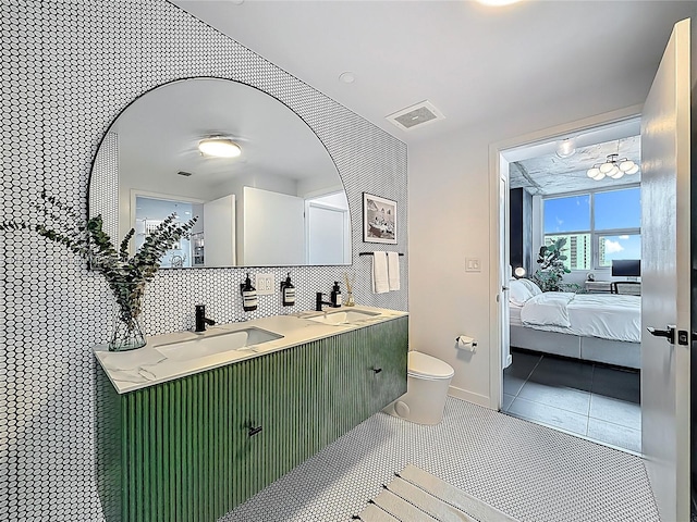 3301 NE 1st Ave Unit H1215, Miami, FL 33137 - ensuite bathroom with double vanity and tile patterned flooring