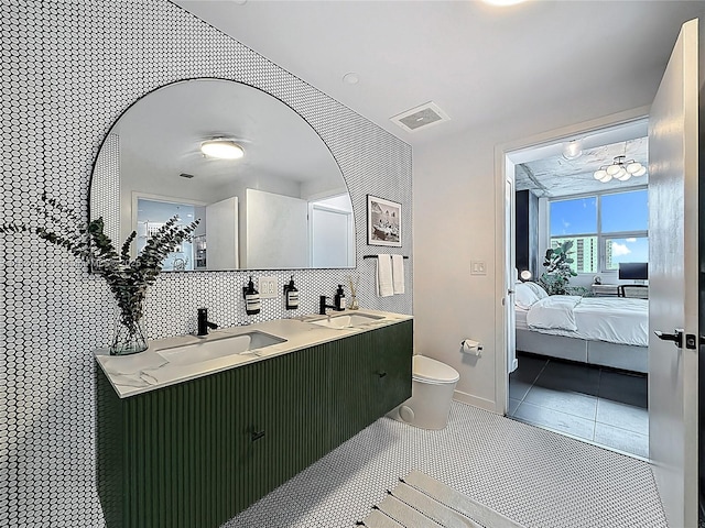 3301 NE 1st Ave Unit H1215, Miami, FL 33137 - ensuite bathroom featuring double vanity and tile patterned flooring