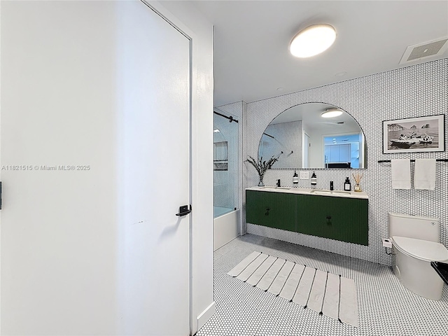 3301 NE 1st Ave Unit H1215, Miami, FL 33137 - bathroom featuring tile patterned floors, vanity, and shower / tub combination