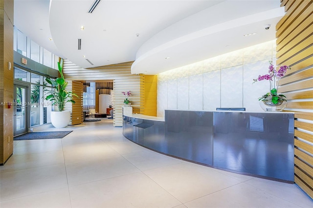 3301 NE 1st Ave Unit H1215, Miami, FL 33137 - welcome area with wood walls and a high ceiling