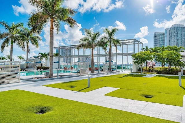 3301 NE 1st Ave Unit H1215, Miami, FL 33137 - surrounding community featuring a lawn and a swimming pool