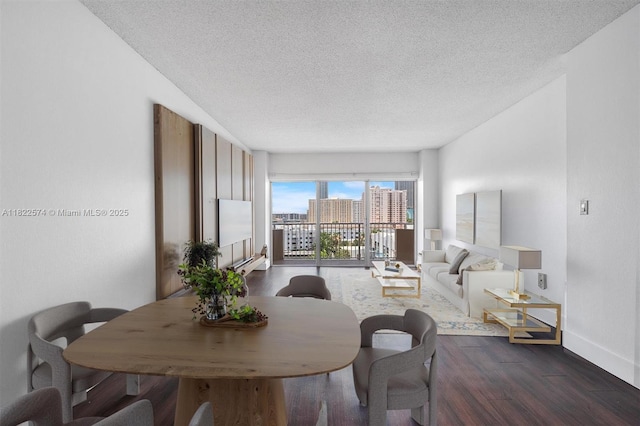 1965 S Ocean Dr Unit 6Q, Hallandale Beach, FL 33009 - dining area with a textured ceiling, dark wood-style floors, and a view of city