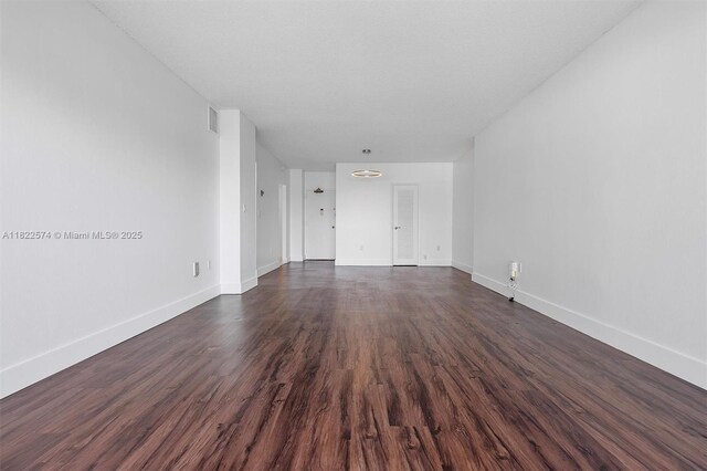 1965 S Ocean Dr Unit 6Q, Hallandale Beach, FL 33009 - spare room with dark wood-type flooring