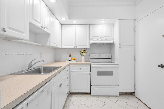 1965 S Ocean Dr Unit 6Q, Hallandale Beach, FL 33009 - kitchen with white appliances, under cabinet range hood, crown molding, white cabinets, and light countertops