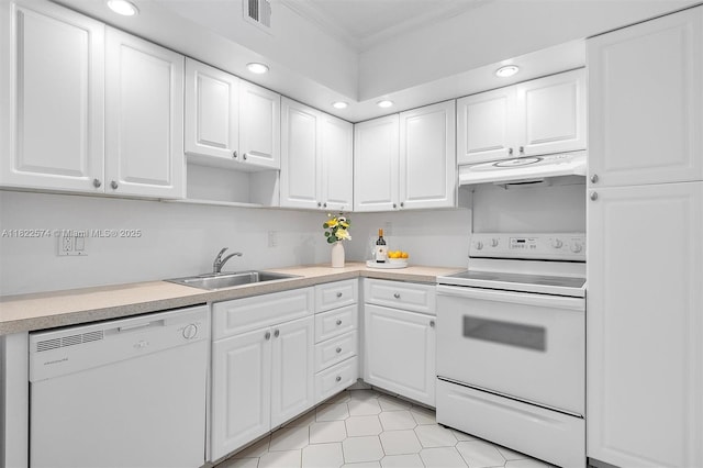 1965 S Ocean Dr Unit 6Q, Hallandale Beach, FL 33009 - kitchen featuring white appliances, under cabinet range hood, ornamental molding, light countertops, and white cabinets