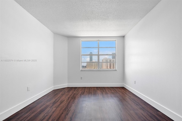 1965 S Ocean Dr Unit 6Q, Hallandale Beach, FL 33009 - empty room featuring dark wood-type flooring and a textured ceiling
