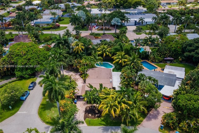 aerial view of residential area featuring a pool