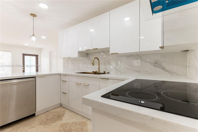 kitchen with stainless steel dishwasher, white cabinetry, modern cabinets, decorative backsplash, and black electric stovetop
