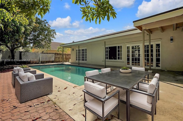7220 NW 44th Ct, Lauderhill, FL 33319 - view of pool with french doors, a patio, and outdoor dining area