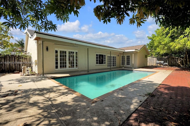7220 NW 44th Ct, Lauderhill, FL 33319 - view of pool featuring french doors and a patio area