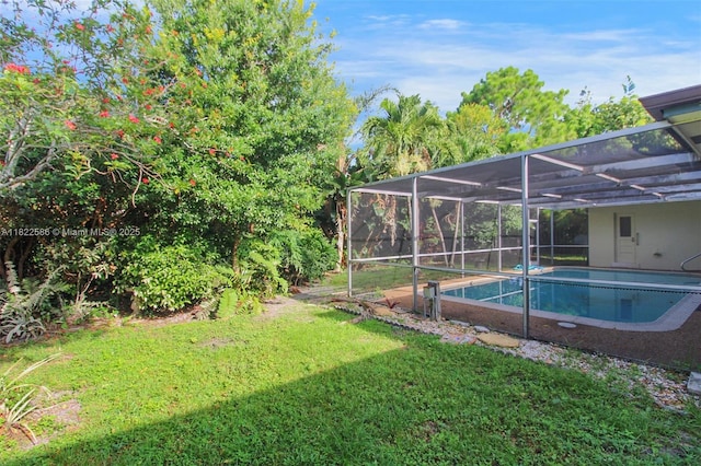 1531 SW 67th Ter, Plantation, FL 33317 - view of grassy yard with an outdoor pool and a lanai