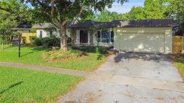 1531 SW 67th Ter, Plantation, FL 33317 - single story home featuring driveway, an attached garage, roof with shingles, mansard roof, and stucco siding