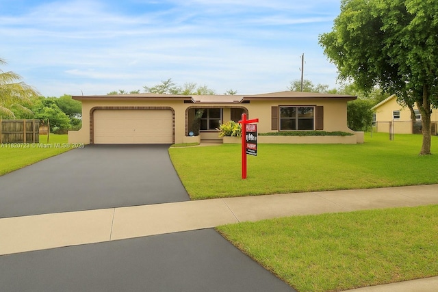 620 NW 88th Ter, Pembroke Pines, FL 33024 - ranch-style home featuring driveway, stucco siding, and an attached garage