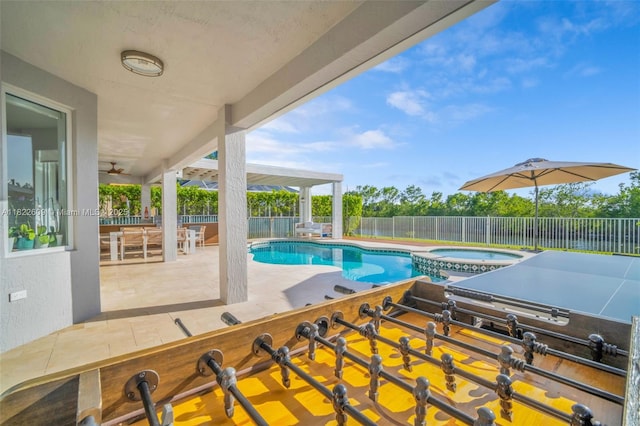 942 Lavender Cir, Weston, FL 33327 - view of swimming pool featuring a patio, a fenced backyard, and a pool with connected hot tub
