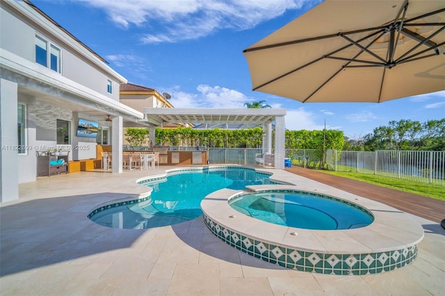 942 Lavender Cir, Weston, FL 33327 - view of pool featuring a patio area and a pool with connected hot tub
