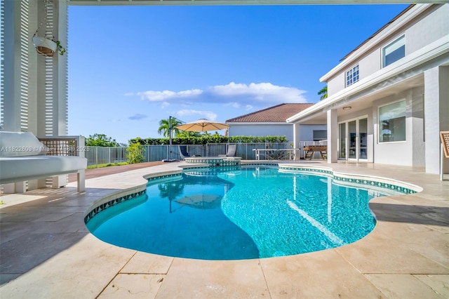 942 Lavender Cir, Weston, FL 33327 - view of swimming pool with a patio area and a pool with connected hot tub
