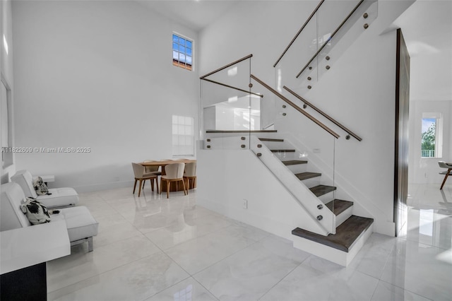 942 Lavender Cir, Weston, FL 33327 - stairway featuring plenty of natural light and a high ceiling