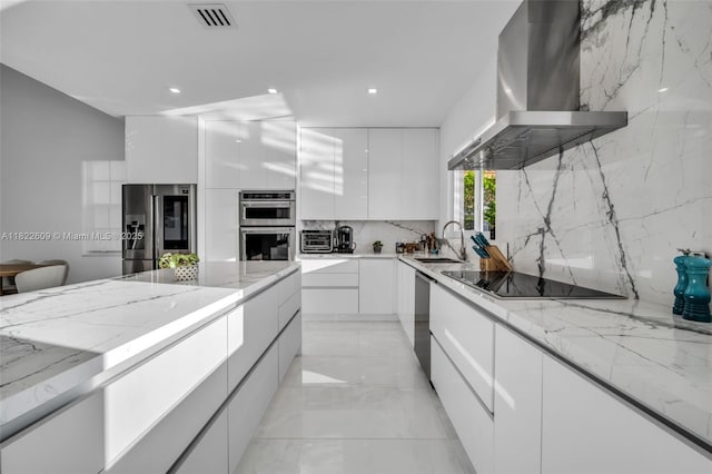 942 Lavender Cir, Weston, FL 33327 - kitchen featuring modern cabinets, ventilation hood, stainless steel appliances, white cabinetry, and recessed lighting