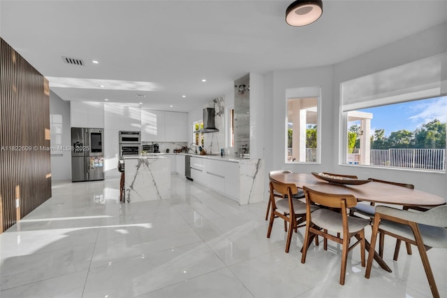 942 Lavender Cir, Weston, FL 33327 - dining space featuring recessed lighting and light marble finish floors