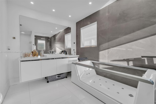 942 Lavender Cir, Weston, FL 33327 - bathroom with vanity, a tub with jets, tile patterned floors, and recessed lighting