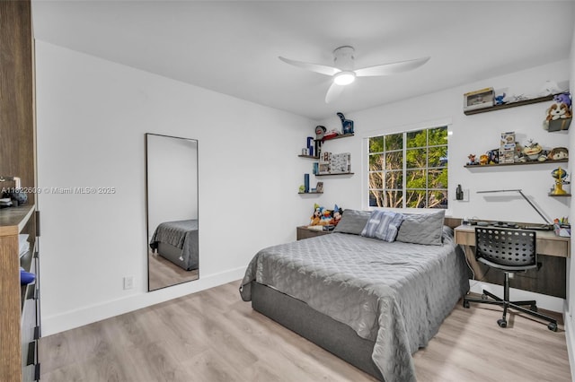 942 Lavender Cir, Weston, FL 33327 - bedroom featuring wood finished floors and a ceiling fan