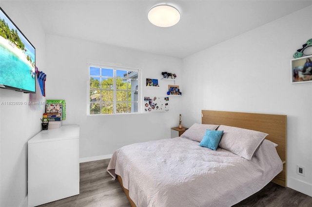 942 Lavender Cir, Weston, FL 33327 - bedroom featuring wood finished floors and baseboards