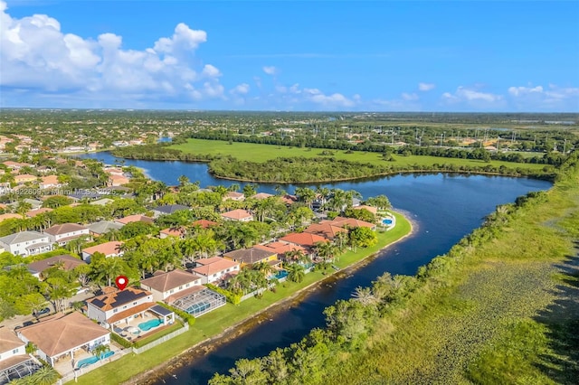 942 Lavender Cir, Weston, FL 33327 - aerial perspective of suburban area with a large body of water