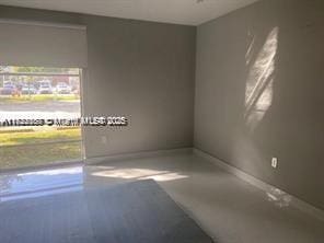 17570 Atlantic Blvd Unit 119, Sunny Isles Beach, FL 33160 - unfurnished room with concrete flooring