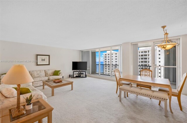 4280 Galt Ocean Dr Unit 12H, Fort Lauderdale, FL 33308 - kitchen with stainless steel appliances, ceiling fan, light tile patterned flooring, light countertops, and white cabinetry