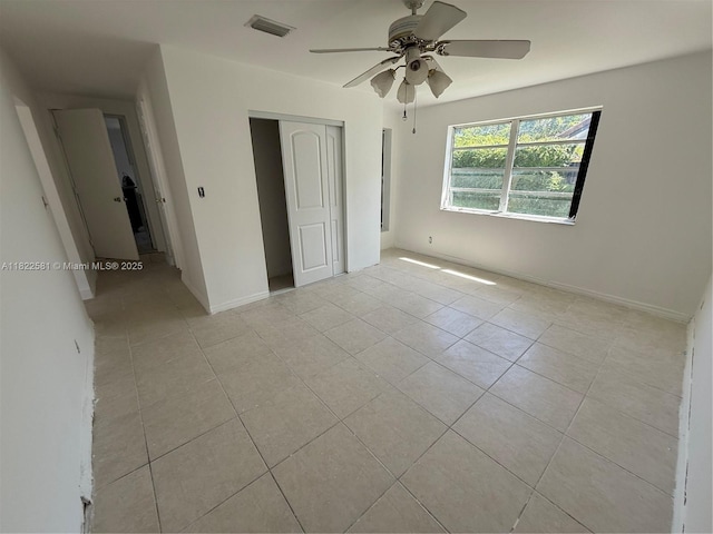 9801 SW 56th St, Miami, FL 33165 - unfurnished bedroom with light tile patterned floors, a closet, and ceiling fan