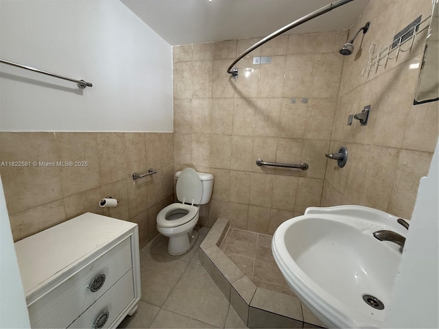9801 SW 56th St, Miami, FL 33165 - full bathroom with tile walls, a tile shower, and tile patterned flooring