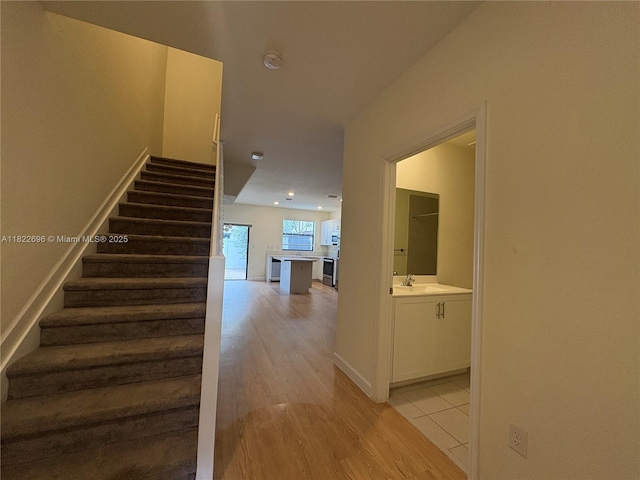 10586 W 33rd Ct Unit 10586, Hialeah, FL 33018 - stairway featuring wood finished floors and recessed lighting