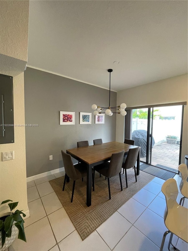 10586 W 33rd Ct Unit 10586, Hialeah, FL 33018 - dining space featuring light tile patterned floors, a chandelier, and electric panel