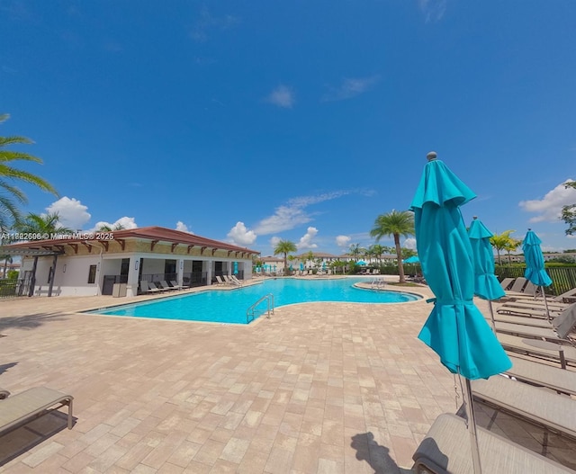 10586 W 33rd Ct Unit 10586, Hialeah, FL 33018 - community pool with a patio