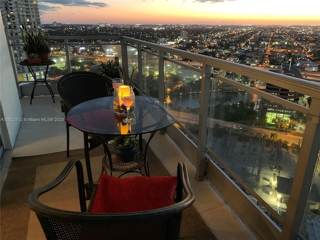 90 SW 3rd St Unit 3010, Miami, FL 33130 - balcony at dusk featuring a view of city