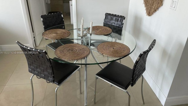 90 SW 3rd St Unit 3010, Miami, FL 33130 - dining area with baseboards and tile patterned floors