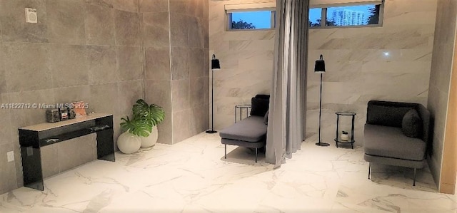 90 SW 3rd St Unit 3010, Miami, FL 33130 - sitting room with tile walls and marble finish flooring