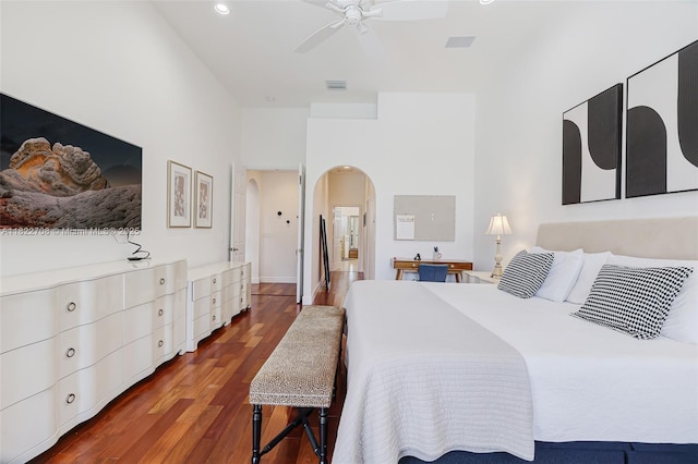 2489 Eagle Watch Ln, Weston, FL 33327 - bedroom featuring arched walkways, wood finished floors, and recessed lighting