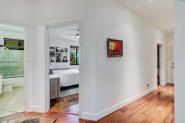 2489 Eagle Watch Ln, Weston, FL 33327 - corridor with wood finished floors and baseboards