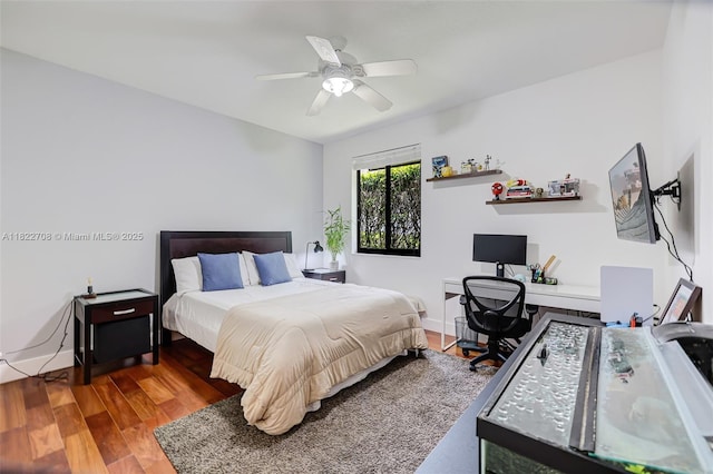 2489 Eagle Watch Ln, Weston, FL 33327 - bedroom with wood finished floors, a ceiling fan, and an office area
