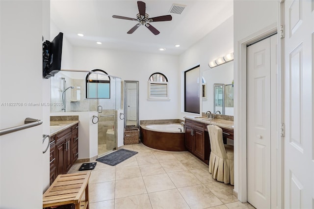2489 Eagle Watch Ln, Weston, FL 33327 - bathroom with vanity, a bath, a shower stall, ceiling fan, and recessed lighting