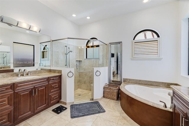 2489 Eagle Watch Ln, Weston, FL 33327 - full bathroom with vanity, a garden tub, a stall shower, and recessed lighting