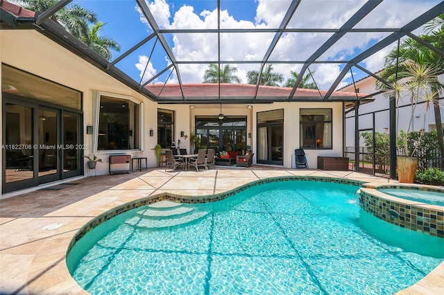 2489 Eagle Watch Ln, Weston, FL 33327 - view of pool with a patio area, a pool with connected hot tub, ceiling fan, and a lanai