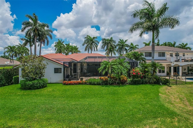 2489 Eagle Watch Ln, Weston, FL 33327 - back of house featuring a tiled roof, stucco siding, and a lanai